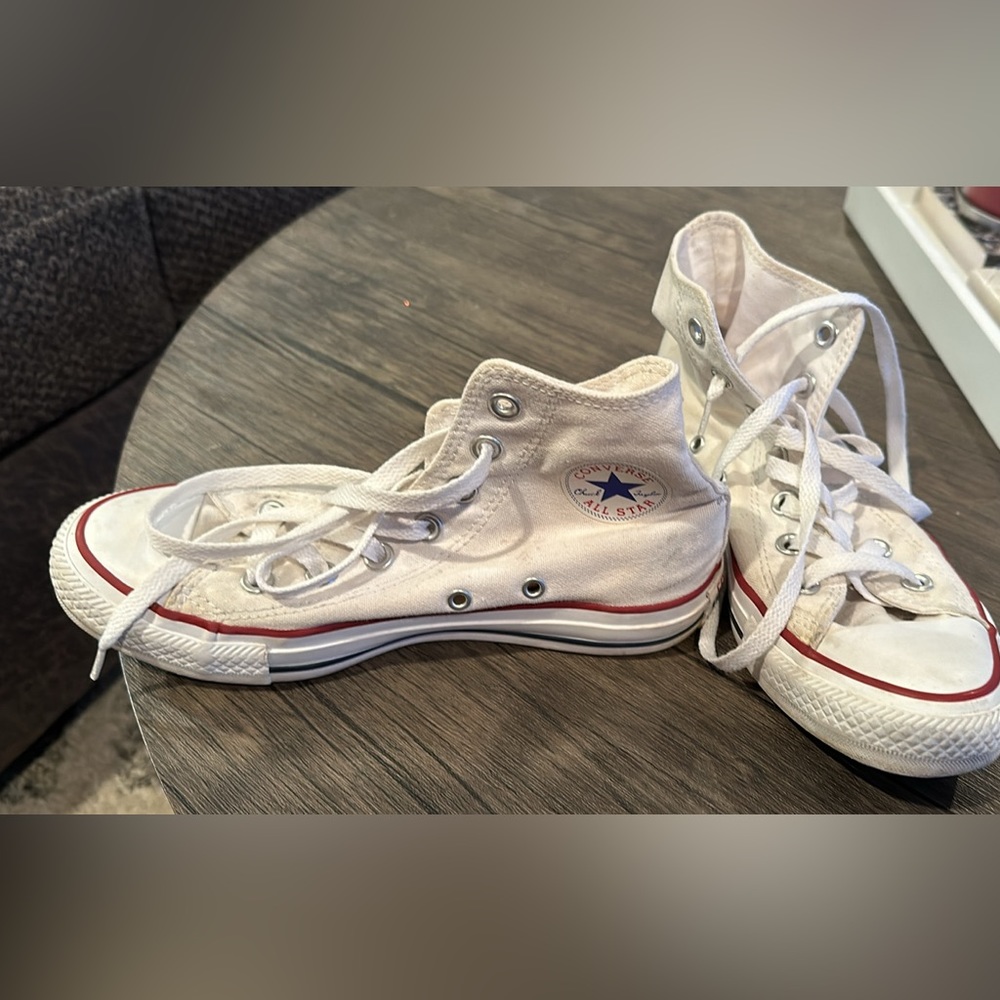 Converse High-Top Sneakers. Women’s size 6. Men’s size 4.